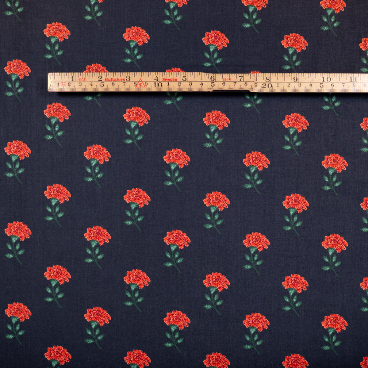 tissu popeline florale oeillets