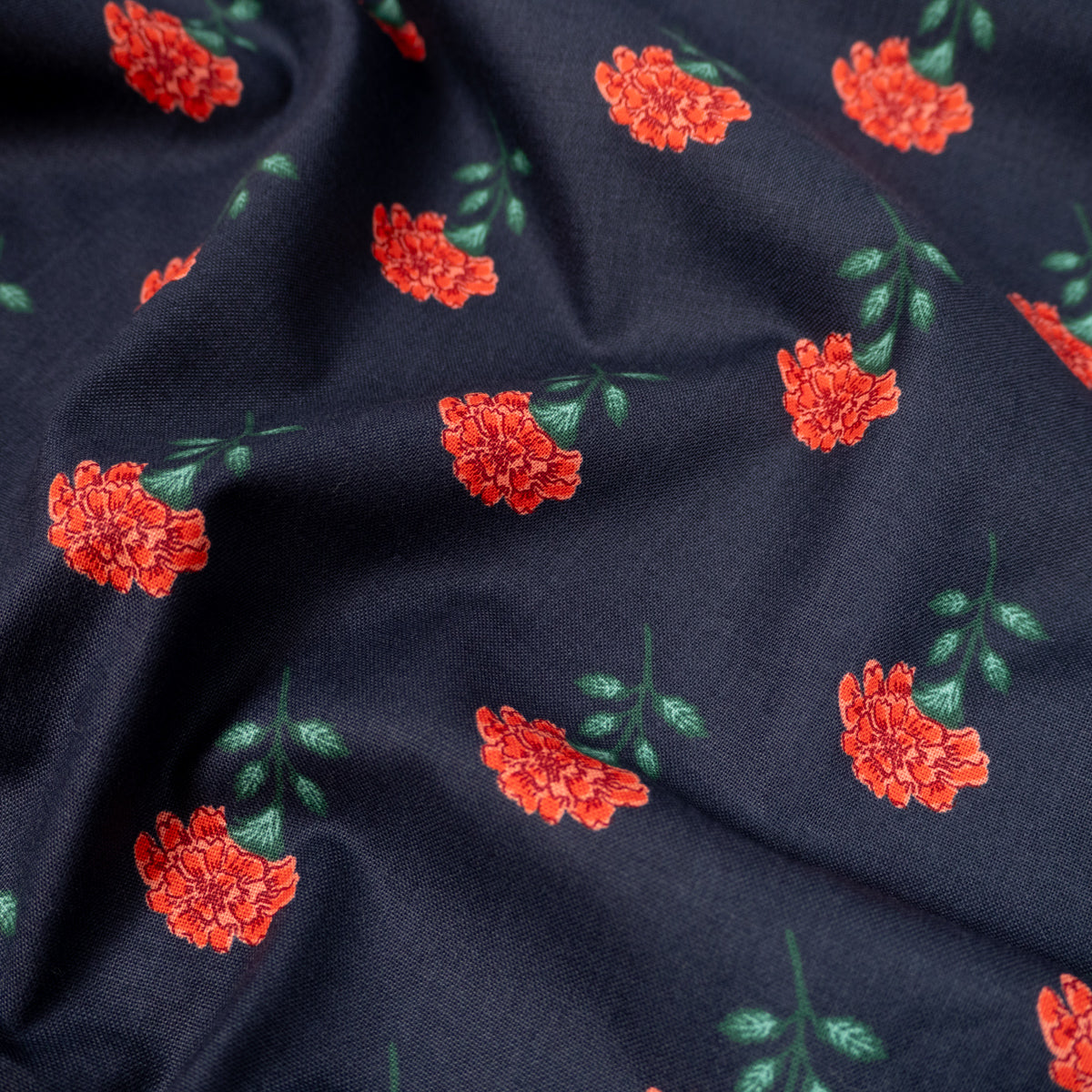 tissu popeline florale oeillets